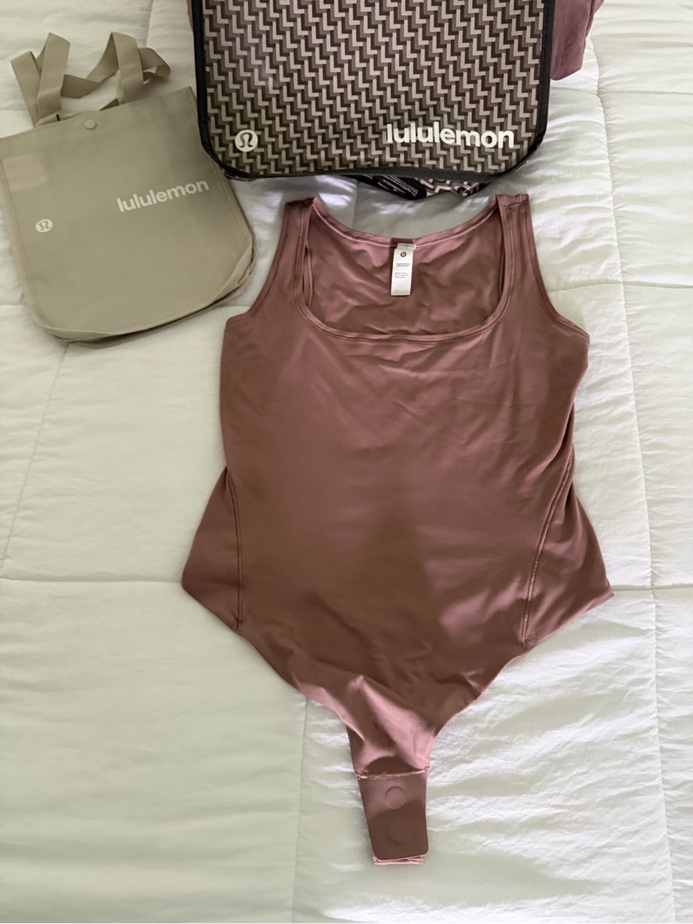 Lululemon twilight Rose Nulu sleeveless square neck  Bodysuit snap closure